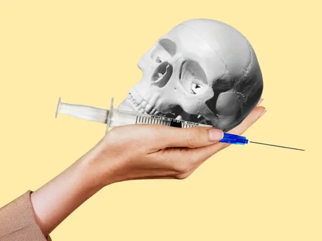 human skull and syringe