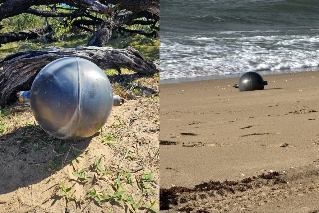 space balls Australia, mysterious spheres Australia, metal balls beach Australia, unknown objects washed ashore Australia, strange balls Sydney beach, space debris Australia, ocean spheres mystery, metallic balls coastline Australia