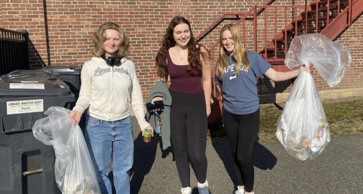 young american women with recycling bags