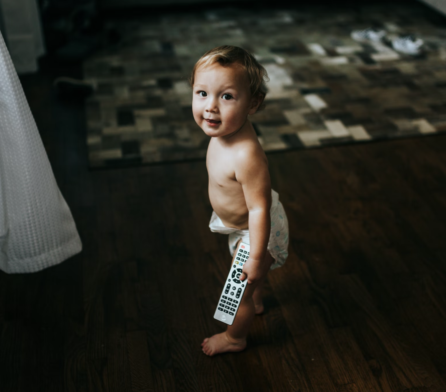 wet wipes baby holding remote