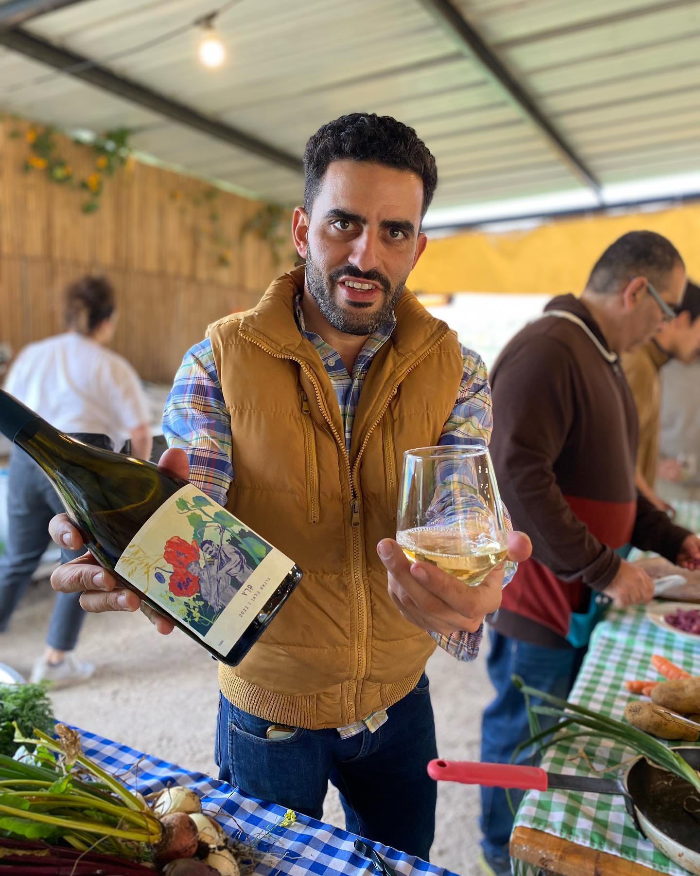 Yakir Knafo offering a taste of local, Israeli wine